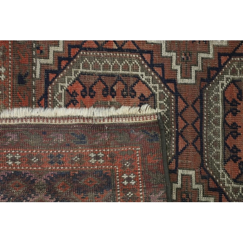 753 - Afghan rust red rug, 152cm x 90cm