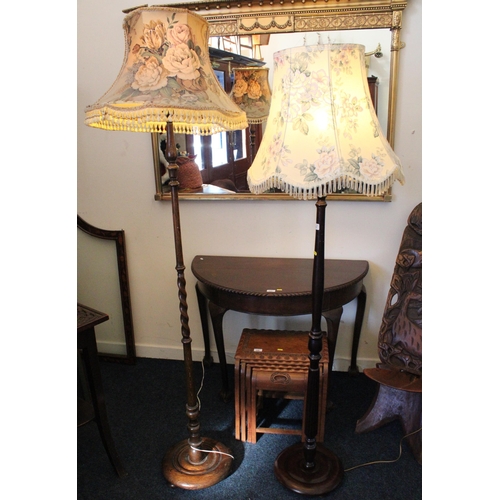 686 - Oak barley twist standard lamp and shade, and another.  (2)