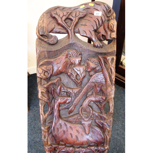 687 - African birthing chair decorated with lions, giraffes and other animals, 98cm high.