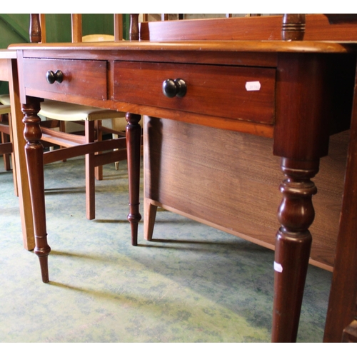 707 - Mahogany side table with two under-tier drawers, 81cm high.