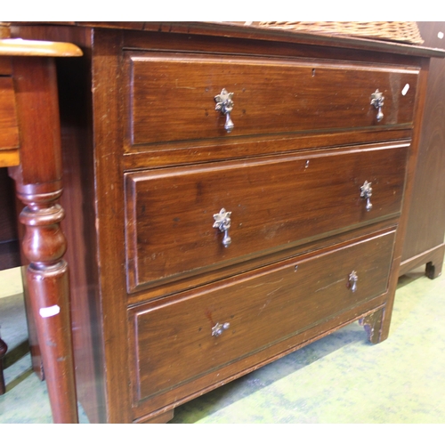 709 - 1920s chest of three drawers.