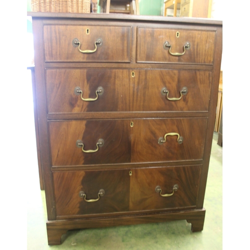 710 - Dark mahogany chest of two short over three long drawers, 100cm high.