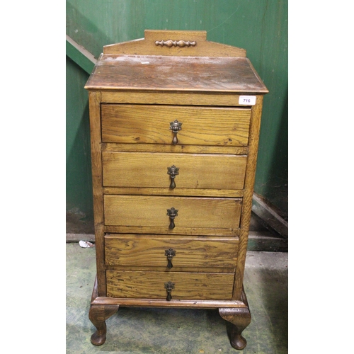 716 - 1920s oak chest of five drawers raised on cabriole legs, 85cm high.