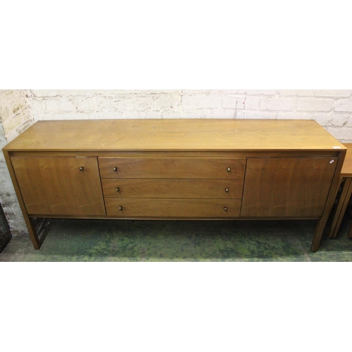 718 - 1960s retro sideboard with three central drawers flanked by cupboards, 73cm high.