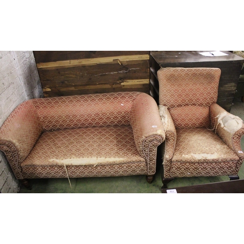 725 - Two-piece salon suite comprising two seater sofa and single seat armchair.