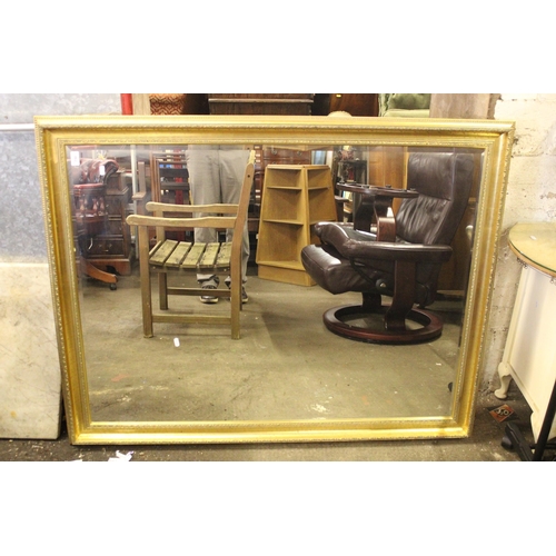 730 - Gilt framed wall mirror, 137cm x 102cm.