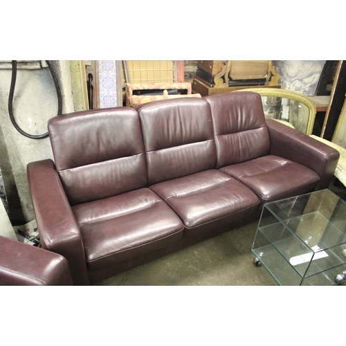 738 - Ekornes Stressless dark burgundy leather lounge suite comprising armchair, two seater sofa, three se... 