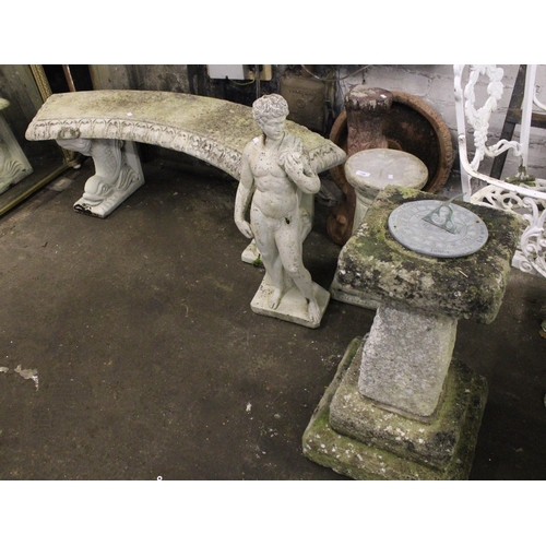 739 - Stoneware garden furniture to include an arch shaped bench raised on dolphin supports, a bird bath, ... 