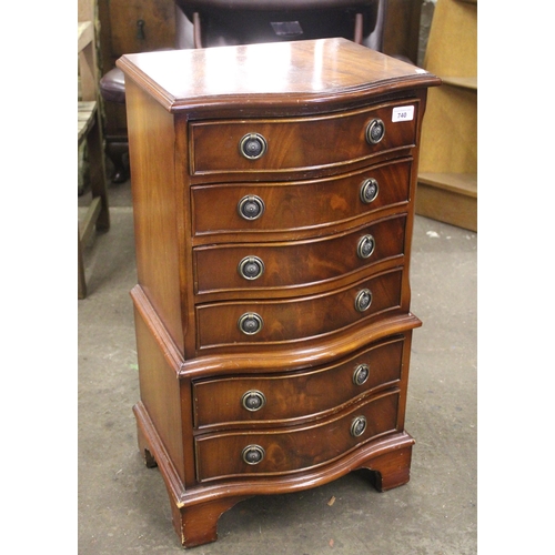 740 - Reproduction mahogany serpentine fronted miniature chest of chest of six drawers.