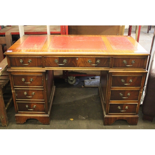 746 - Reproduction mahogany twin pedestal kneehole desk.