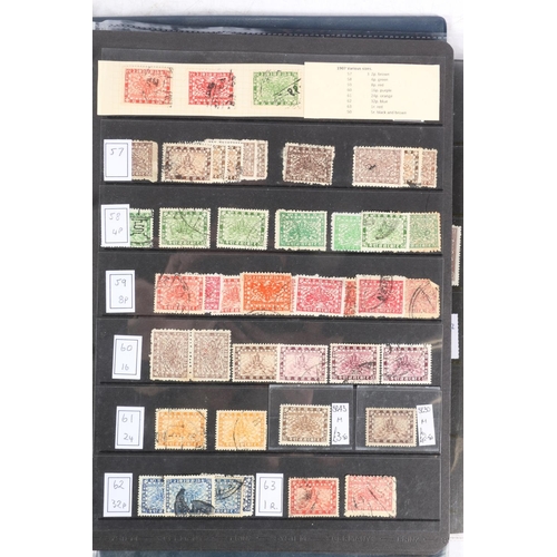 626 - Stamp collection held across six albums to include two green leatherette covered albums of Nepalese ... 