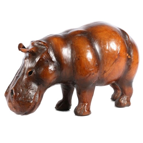 Leather bound model of a hippopotamus in the manner of Liberty, 44cm long.