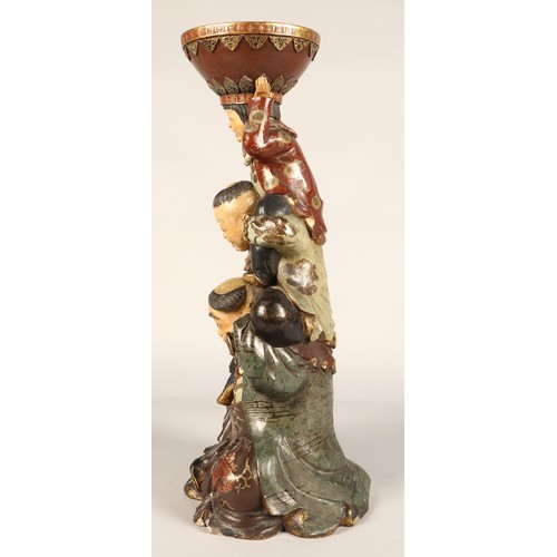 208 - Pair of Chinese pottery figure stands, each with a figure with two children on their shoulders suppo... 