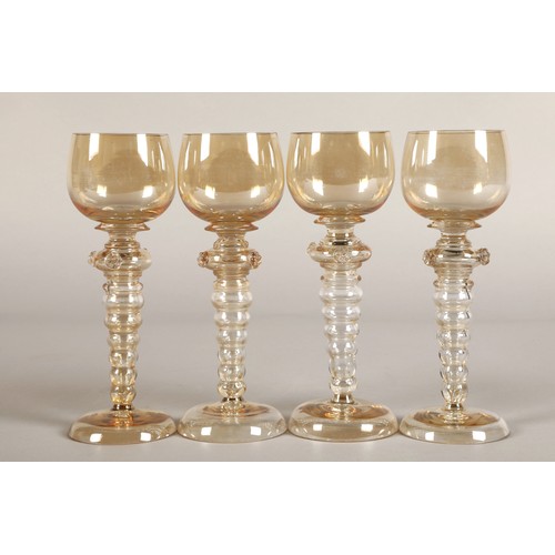 238 - Set of four hock glasses with bubble glass stems 19.5cm high.