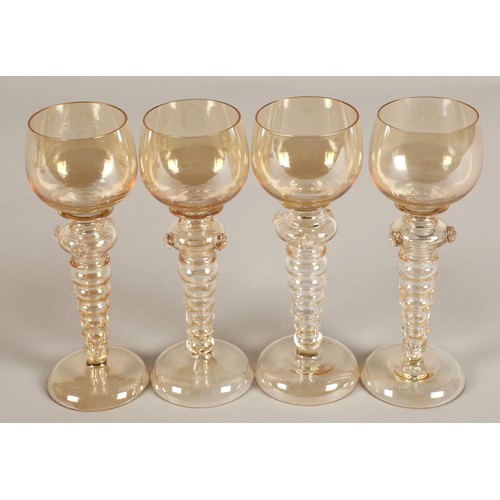 238 - Set of four hock glasses with bubble glass stems 19.5cm high.