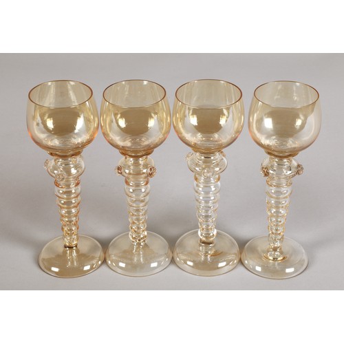 238 - Set of four hock glasses with bubble glass stems 19.5cm high.