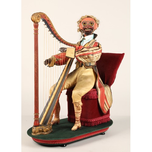 274 - An antique musical automaton in the form of a seated monkey harp player, being a variation on number... 