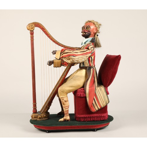 274 - An antique musical automaton in the form of a seated monkey harp player, being a variation on number... 