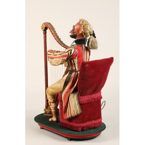 274 - An antique musical automaton in the form of a seated monkey harp player, being a variation on number... 