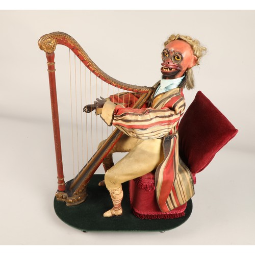 274 - An antique musical automaton in the form of a seated monkey harp player, being a variation on number... 