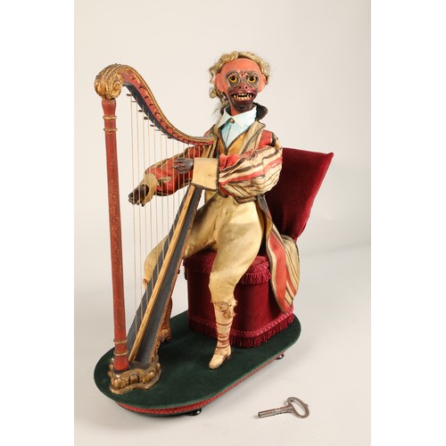 274 - An antique musical automaton in the form of a seated monkey harp player, being a variation on number... 