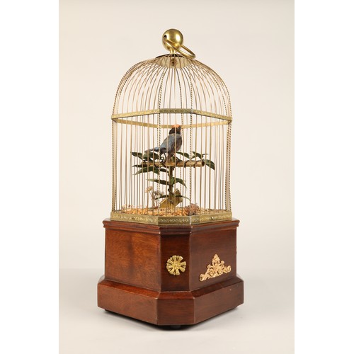 268 - A good antique coin operated mechanical singing bird in a cage, made by Bontems of Paris, circa 1910... 