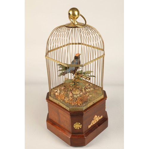 268 - A good antique coin operated mechanical singing bird in a cage, made by Bontems of Paris, circa 1910... 