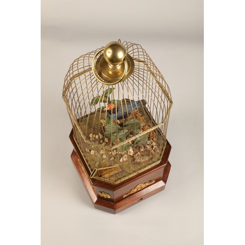 268 - A good antique coin operated mechanical singing bird in a cage, made by Bontems of Paris, circa 1910... 