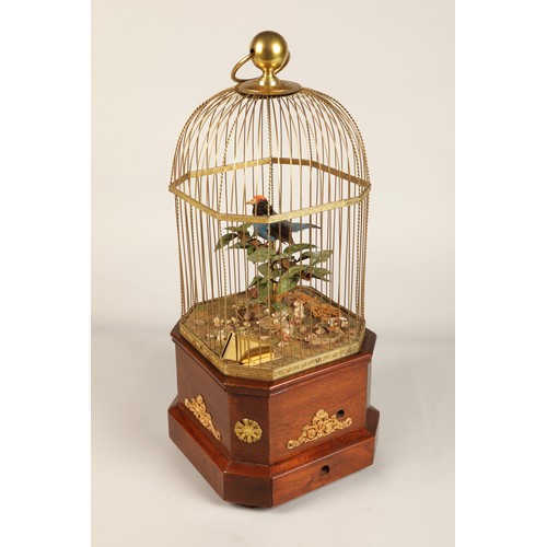 268 - A good antique coin operated mechanical singing bird in a cage, made by Bontems of Paris, circa 1910... 