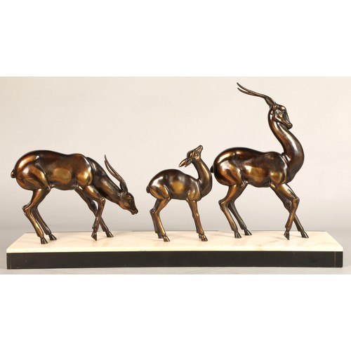 243 - Three Art Deco Gazelles on marble plinth, 65 x 17 x 36 cm