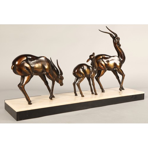 243 - Three Art Deco Gazelles on marble plinth, 65 x 17 x 36 cm