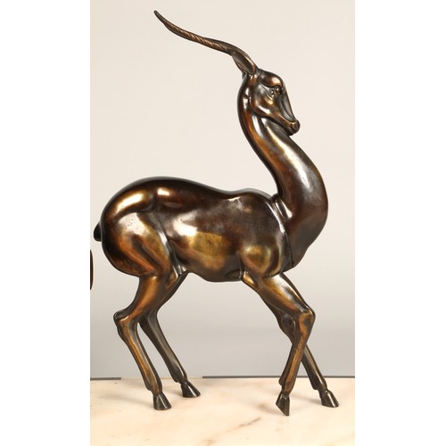 243 - Three Art Deco Gazelles on marble plinth, 65 x 17 x 36 cm