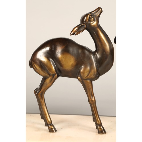 243 - Three Art Deco Gazelles on marble plinth, 65 x 17 x 36 cm