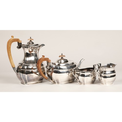 185 - Four piece silver tea service, with hard wood stylised handles, assay marked Sheffield 1968, 1770 gr... 