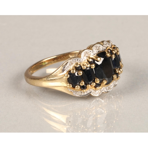 64 - 9ct gold diamond and sapphire gem set ring, size R