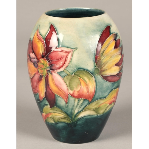 188 - Moorcroft floral vase, (Heavily restored) 11.5cm height