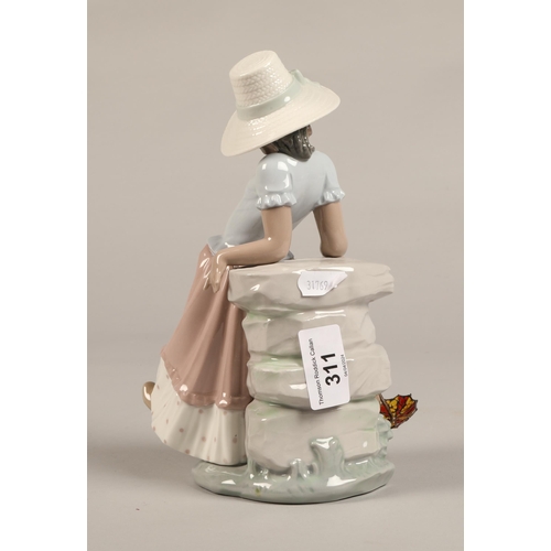 311 - Lladro figure of a girl in a bonnet, 23 cm