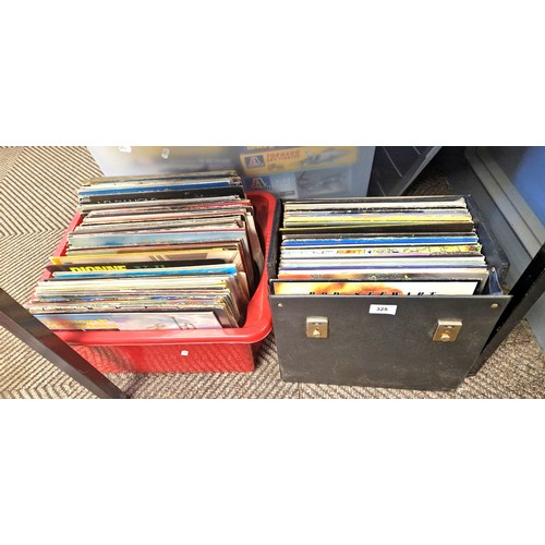 325 - Two boxes of records LPs, assorted popular music including Rod Stewart, The Who, Eagles, etc