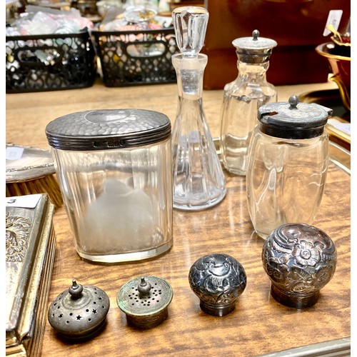 313 - Small quantity of items including silver topped perfume bottles, jars, silver backed hair brush,