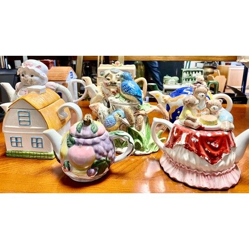 269 - Ten novelty teapots