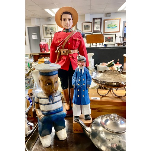 267 - Canadian 'Mountie' mounted police doll, 45cm without hat, carved wooden sailors, teddy bear, hammere... 