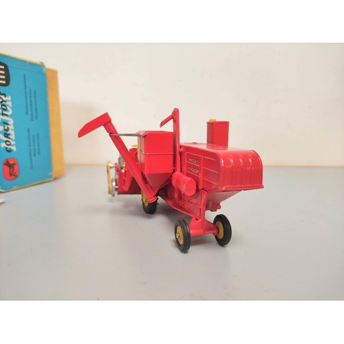 89 - Corgi Toys. No. 1111 Massey Ferguson 780 Combine Harvester. Contained in original box, with two inne... 