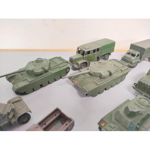 91 - Dinky Toys/Supertoys. A group of die-cast military vehicles to include 2 x 651 Centurion Tanks, 660 ... 