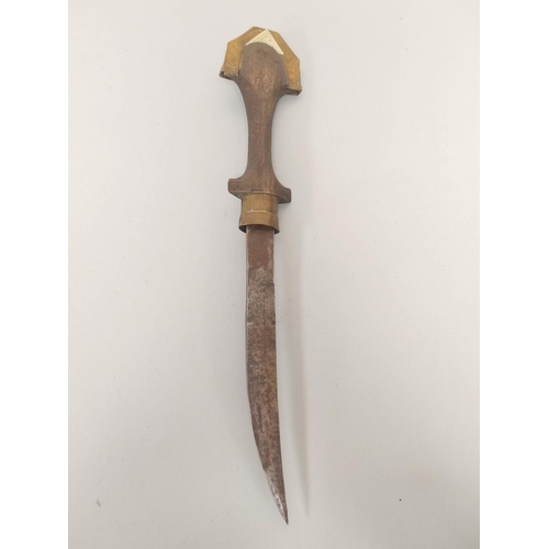 348 - Arabic Jambiya dagger of elongated form with white metal and brass mounts and wooden handle. 