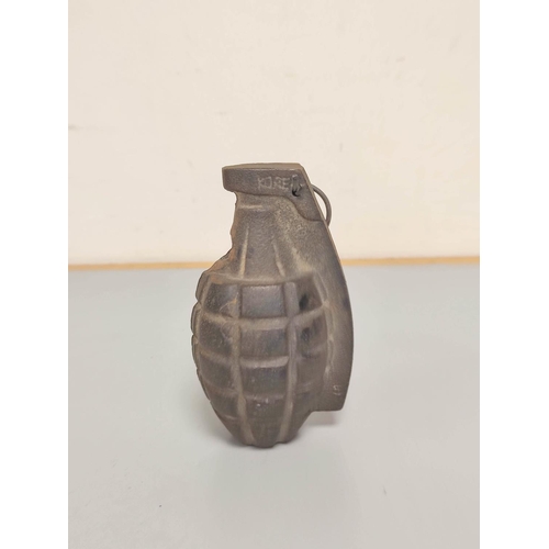 379 - US Mk. II pineapple training grenade of cast iron construction inscribed ''Korea'' above spoon. ... 