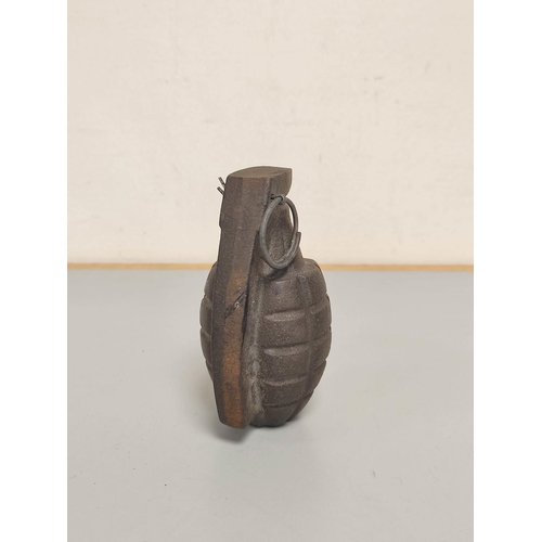 379 - US Mk. II pineapple training grenade of cast iron construction inscribed ''Korea'' above spoon. ... 