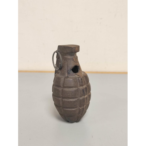 379 - US Mk. II pineapple training grenade of cast iron construction inscribed ''Korea'' above spoon. ... 