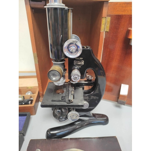 460 - Beck London model 47 monocular microscope serial no. 25089, in black enamel finish, in mahogany stor... 