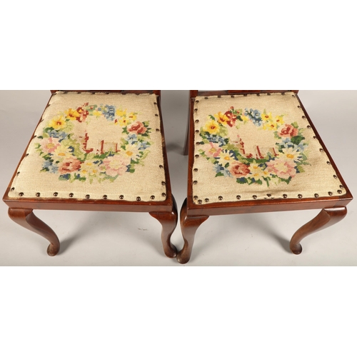 591 - Pair of mahogany hall chairs, with floral tapestry seats (2)