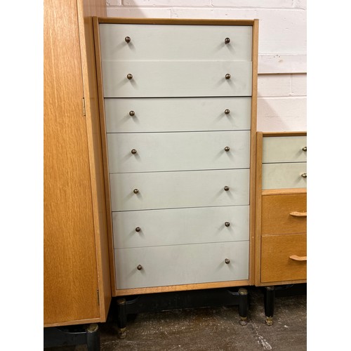 595 - G Plan mid century bedroom suite including tall and short chests of drawers, six over four dresser, ... 